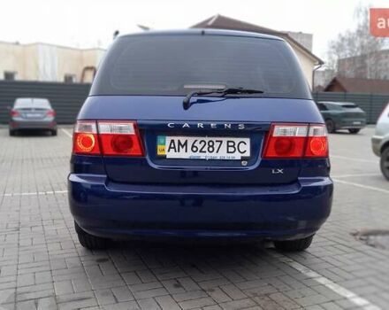 Синий Киа Каренс, объемом двигателя 2 л и пробегом 190 тыс. км за 4800 $, фото 27 на Automoto.ua