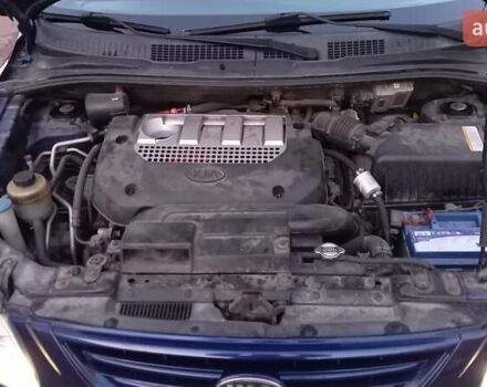 Синий Киа Каренс, объемом двигателя 2 л и пробегом 190 тыс. км за 4700 $, фото 13 на Automoto.ua