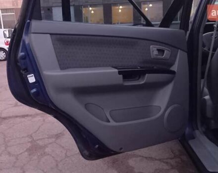 Синий Киа Каренс, объемом двигателя 2 л и пробегом 190 тыс. км за 4700 $, фото 15 на Automoto.ua