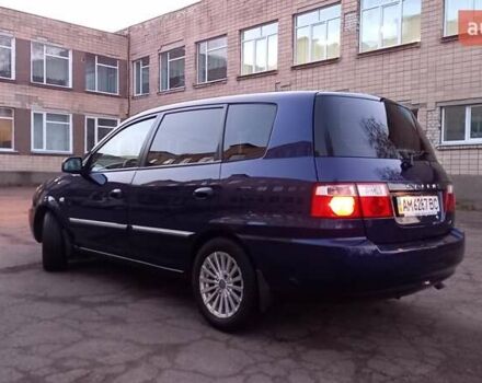 Синий Киа Каренс, объемом двигателя 2 л и пробегом 190 тыс. км за 4700 $, фото 8 на Automoto.ua