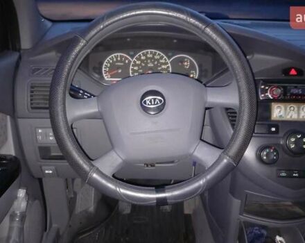 Синий Киа Каренс, объемом двигателя 2 л и пробегом 190 тыс. км за 4700 $, фото 19 на Automoto.ua