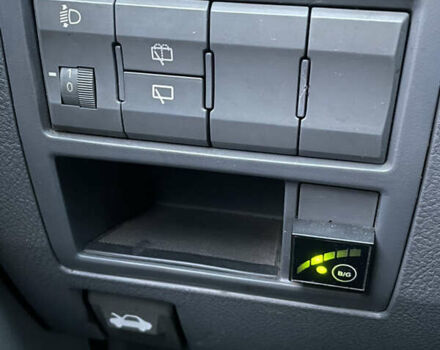 Синий Киа Каренс, объемом двигателя 2 л и пробегом 187 тыс. км за 3900 $, фото 9 на Automoto.ua