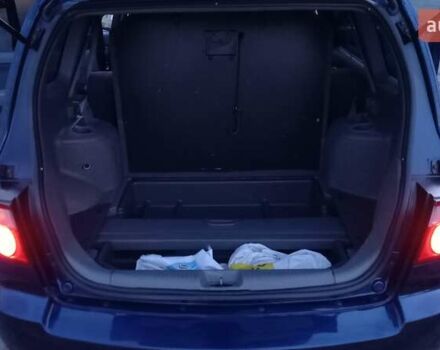 Синий Киа Каренс, объемом двигателя 2 л и пробегом 190 тыс. км за 4700 $, фото 22 на Automoto.ua