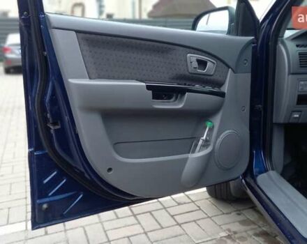 Синий Киа Каренс, объемом двигателя 2 л и пробегом 190 тыс. км за 4800 $, фото 15 на Automoto.ua