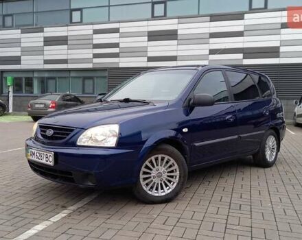Синий Киа Каренс, объемом двигателя 2 л и пробегом 190 тыс. км за 4800 $, фото 3 на Automoto.ua