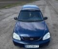 Синій Кіа Каренс, об'ємом двигуна 1.59 л та пробігом 266 тис. км за 4600 $, фото 1 на Automoto.ua