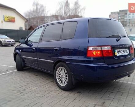 Синий Киа Каренс, объемом двигателя 2 л и пробегом 190 тыс. км за 4800 $, фото 9 на Automoto.ua