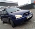 Синій Кіа Каренс, об'ємом двигуна 2 л та пробігом 190 тис. км за 4800 $, фото 1 на Automoto.ua
