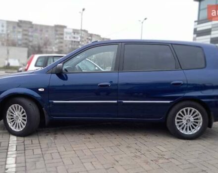 Синий Киа Каренс, объемом двигателя 2 л и пробегом 190 тыс. км за 4800 $, фото 7 на Automoto.ua