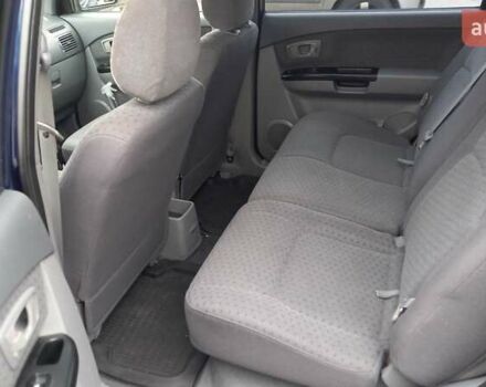 Синий Киа Каренс, объемом двигателя 2 л и пробегом 190 тыс. км за 4800 $, фото 21 на Automoto.ua