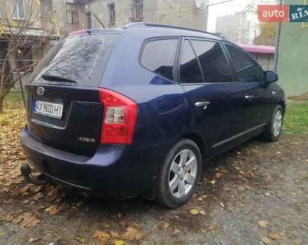 Синий Киа Каренс, объемом двигателя 2 л и пробегом 244 тыс. км за 6000 $, фото 7 на Automoto.ua