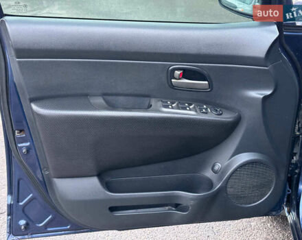 Синий Киа Каренс, объемом двигателя 2 л и пробегом 234 тыс. км за 6990 $, фото 11 на Automoto.ua