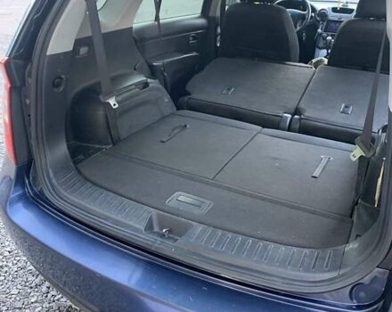 Синий Киа Каренс, объемом двигателя 2 л и пробегом 234 тыс. км за 6500 $, фото 3 на Automoto.ua