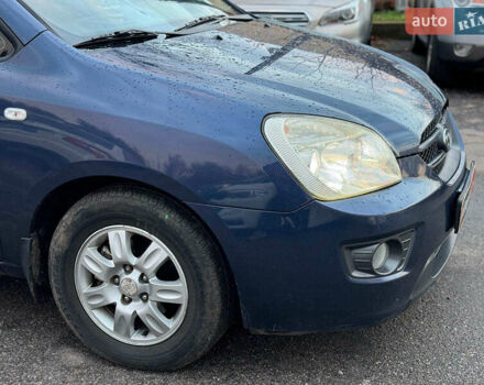 Синий Киа Каренс, объемом двигателя 2 л и пробегом 234 тыс. км за 6990 $, фото 3 на Automoto.ua