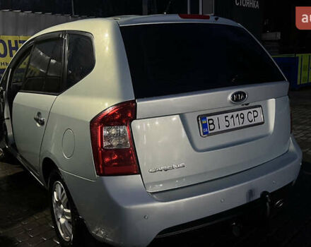 Синий Киа Каренс, объемом двигателя 2 л и пробегом 222 тыс. км за 5500 $, фото 4 на Automoto.ua
