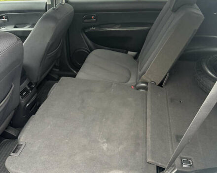 Синій Кіа Каренс, об'ємом двигуна 2 л та пробігом 190 тис. км за 5950 $, фото 14 на Automoto.ua