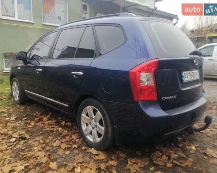 Синий Киа Каренс, объемом двигателя 2 л и пробегом 244 тыс. км за 6000 $, фото 6 на Automoto.ua