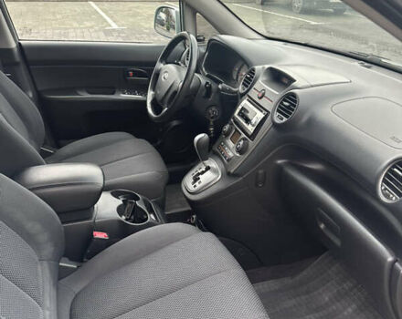 Синій Кіа Каренс, об'ємом двигуна 2 л та пробігом 190 тис. км за 5950 $, фото 11 на Automoto.ua