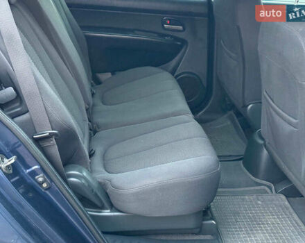 Синий Киа Каренс, объемом двигателя 2 л и пробегом 234 тыс. км за 6990 $, фото 18 на Automoto.ua