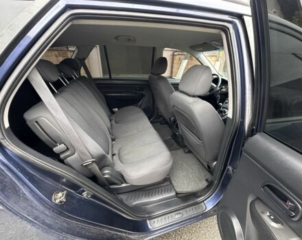 Синій Кіа Каренс, об'ємом двигуна 2 л та пробігом 280 тис. км за 2600 $, фото 8 на Automoto.ua