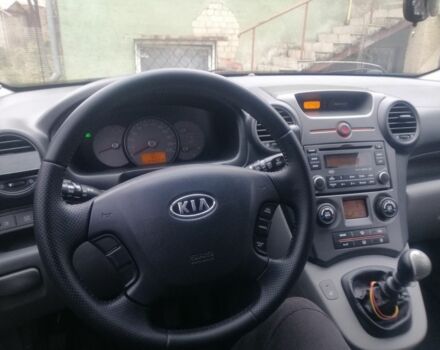 Синий Киа Каренс, объемом двигателя 2 л и пробегом 244 тыс. км за 6000 $, фото 8 на Automoto.ua