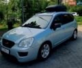 Синий Киа Каренс, объемом двигателя 2 л и пробегом 276 тыс. км за 4700 $, фото 1 на Automoto.ua