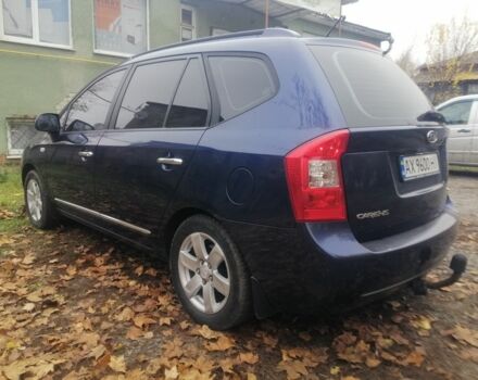 Синий Киа Каренс, объемом двигателя 2 л и пробегом 244 тыс. км за 6000 $, фото 3 на Automoto.ua