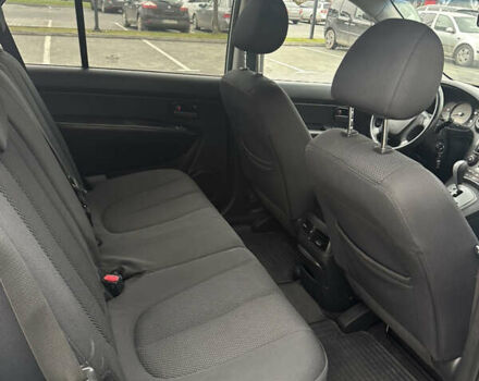 Синій Кіа Каренс, об'ємом двигуна 2 л та пробігом 190 тис. км за 5950 $, фото 10 на Automoto.ua