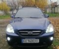 Синий Киа Каренс, объемом двигателя 2 л и пробегом 244 тыс. км за 6000 $, фото 8 на Automoto.ua