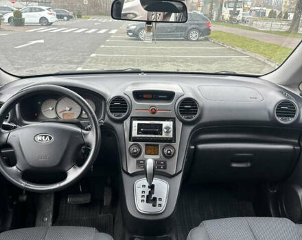 Синій Кіа Каренс, об'ємом двигуна 2 л та пробігом 190 тис. км за 5950 $, фото 8 на Automoto.ua