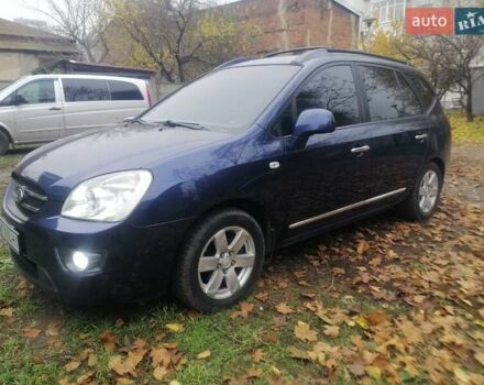 Синий Киа Каренс, объемом двигателя 2 л и пробегом 244 тыс. км за 6000 $, фото 2 на Automoto.ua