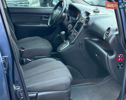 Синий Киа Каренс, объемом двигателя 2 л и пробегом 234 тыс. км за 6990 $, фото 23 на Automoto.ua