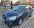 Синий Киа Каренс, объемом двигателя 1.99 л и пробегом 204 тыс. км за 6299 $, фото 1 на Automoto.ua