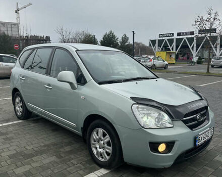 Синій Кіа Каренс, об'ємом двигуна 2 л та пробігом 190 тис. км за 5950 $, фото 4 на Automoto.ua