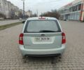 Синій Кіа Каренс, об'ємом двигуна 2 л та пробігом 180 тис. км за 5500 $, фото 4 на Automoto.ua