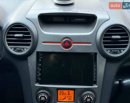 Синий Киа Каренс, объемом двигателя 2 л и пробегом 234 тыс. км за 6990 $, фото 26 на Automoto.ua