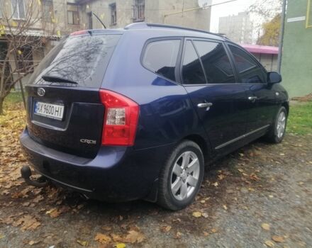 Синий Киа Каренс, объемом двигателя 2 л и пробегом 244 тыс. км за 6000 $, фото 4 на Automoto.ua