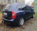 Синий Киа Каренс, объемом двигателя 2 л и пробегом 244 тыс. км за 6000 $, фото 4 на Automoto.ua