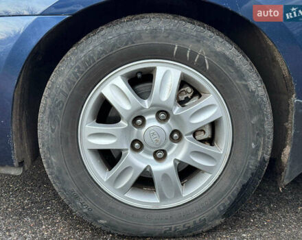 Синий Киа Каренс, объемом двигателя 2 л и пробегом 234 тыс. км за 6990 $, фото 10 на Automoto.ua