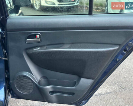 Синий Киа Каренс, объемом двигателя 2 л и пробегом 234 тыс. км за 6990 $, фото 17 на Automoto.ua