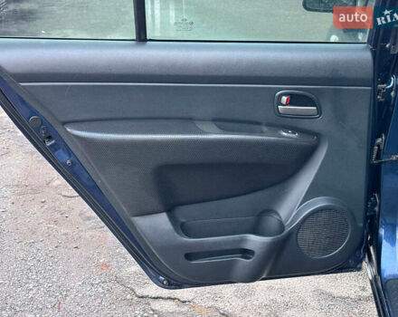 Синий Киа Каренс, объемом двигателя 2 л и пробегом 234 тыс. км за 6990 $, фото 14 на Automoto.ua