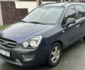 Синій Кіа Каренс, об'ємом двигуна 2 л та пробігом 280 тис. км за 2600 $, фото 4 на Automoto.ua