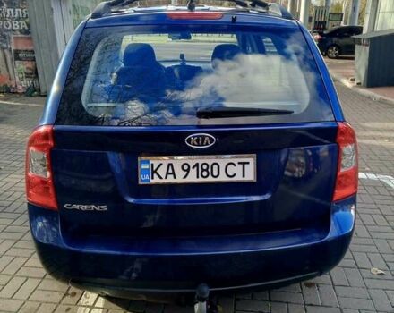 Синий Киа Каренс, объемом двигателя 2 л и пробегом 232 тыс. км за 5800 $, фото 2 на Automoto.ua