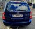 Синий Киа Каренс, объемом двигателя 2 л и пробегом 232 тыс. км за 5800 $, фото 2 на Automoto.ua