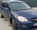Синий Киа Каренс, объемом двигателя 2 л и пробегом 334 тыс. км за 4200 $, фото 1 на Automoto.ua