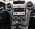 Синий Киа Каренс, объемом двигателя 2 л и пробегом 232 тыс. км за 5800 $, фото 9 на Automoto.ua