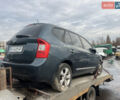 Синий Киа Каренс, объемом двигателя 2 л и пробегом 176 тыс. км за 1999 $, фото 1 на Automoto.ua