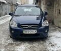 Синий Киа Каренс, объемом двигателя 2 л и пробегом 227 тыс. км за 5200 $, фото 1 на Automoto.ua