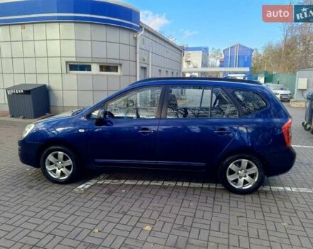 Синий Киа Каренс, объемом двигателя 2 л и пробегом 232 тыс. км за 5800 $, фото 1 на Automoto.ua