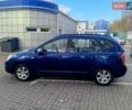 Синий Киа Каренс, объемом двигателя 2 л и пробегом 232 тыс. км за 5800 $, фото 1 на Automoto.ua